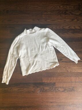 A new day white sweater